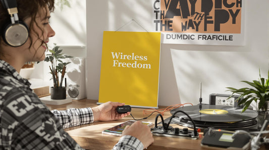 Person connecting wired headphones to Bluetooth receiver with modern devices