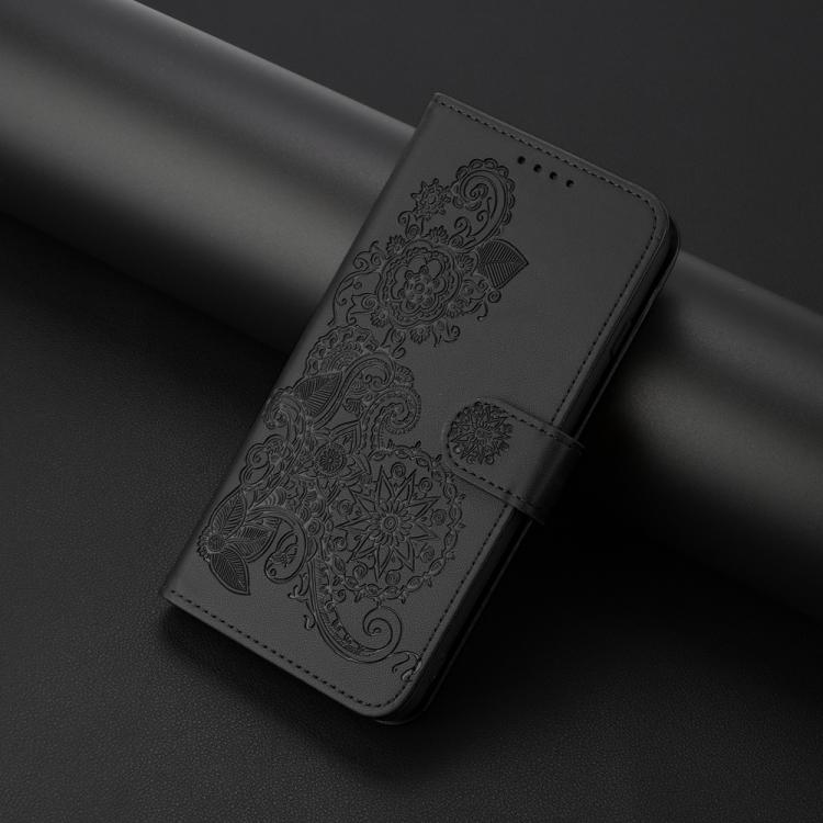 For iPhone 17 Datura Flower Embossed Flip Leather Phone Case(Black)