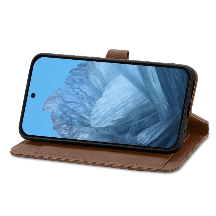For Google Pixel 9 Embossed Flower Zipper Leather Phone Case(Brown)