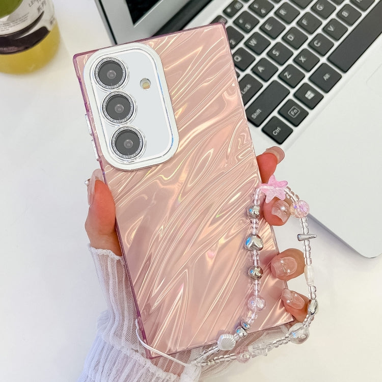 For Samsung Galaxy S25+ 5G Plating Glitter Texture Chain Wristband TPU Phone Case with Lens Film(Pink Water Ripples)
