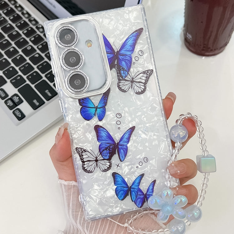 For Samsung Galaxy S25+ 5G Plating Texture Butterfly Wristband TPU Phone Case with Glitter Lens Film(Blue Butterflies HU3)