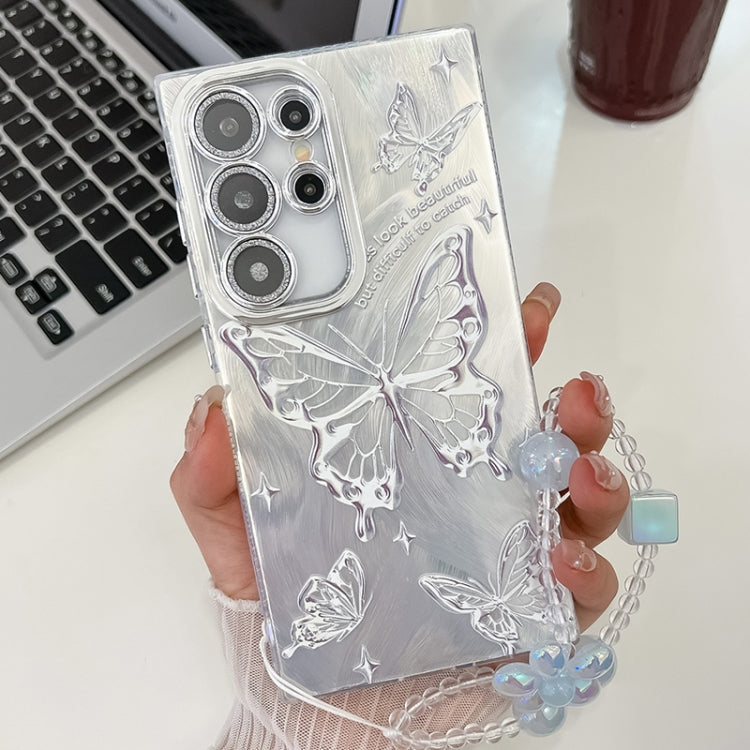 For Samsung Galaxy S25 Ultra 5G Plating Texture Butterfly Wristband TPU Phone Case with Glitter Lens Film(Silver Butterflies HU6)