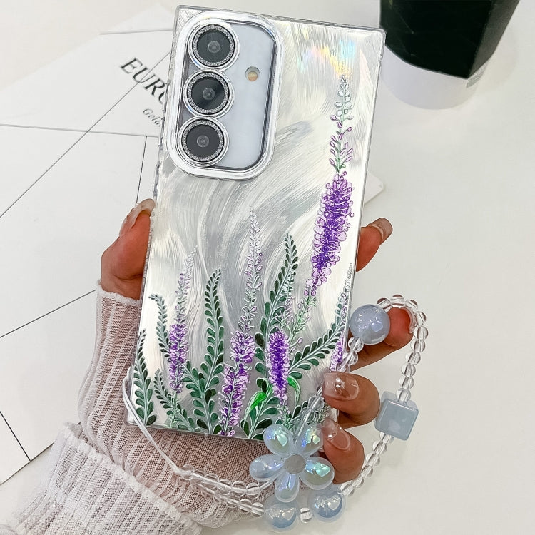 For Samsung Galaxy S25+ 5G Electroplating Flowers Plants Texture Wristband TPU Phone Case(Lavender FL3)