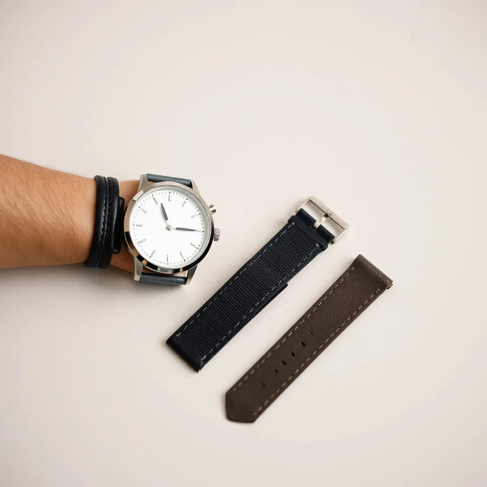 Close-up of a watch with a nylon silicone leather band and visible material textures in soft natural light.