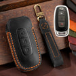 For Nissan Teana / Ariya 3-button Horn Hallmo Car Cowhide Leather Key Protective Cover Key Case(Black) - Car Key Cases by Hallmo | Online Shopping South Africa | PMC TechLife | Buy Now Pay Later Mobicred