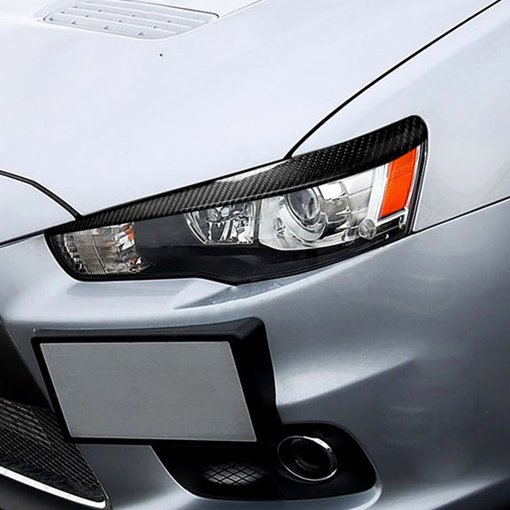 2 PCS / Set Carbon Fiber Car Lamp Eyebrow Decorative Sticker for Mitsubishi Lancer EVO 2008-2014, Drop Glue Version