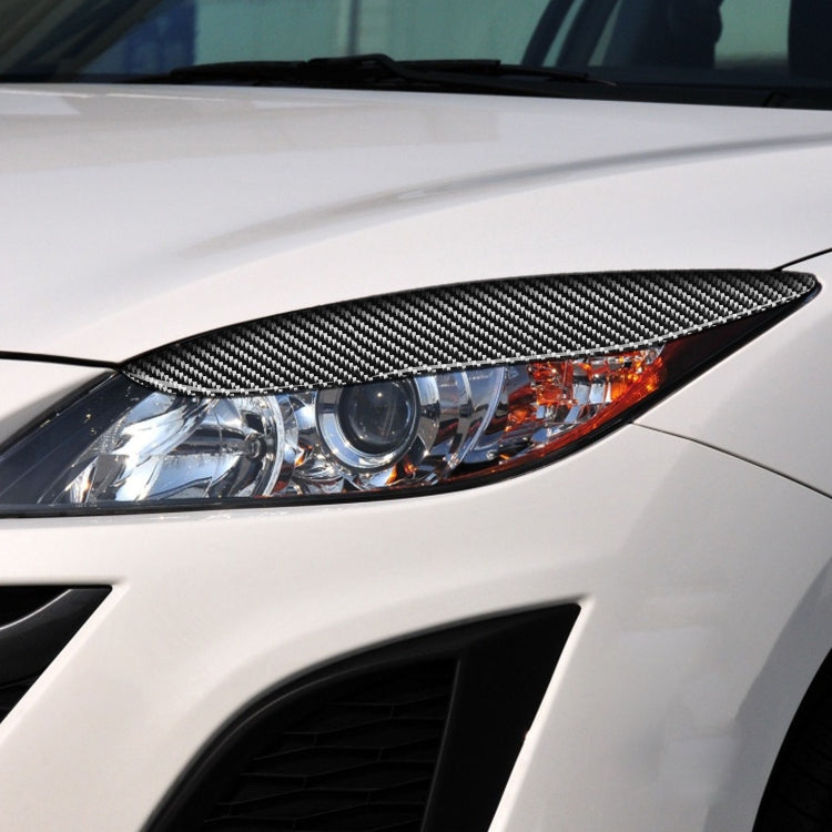 2 PCS / Set Carbon Fiber Car Lamp Eyebrow Decorative Sticker for Mazda 3 2010-2013 / M3 Xingcheng, Drop Glue Version - Lamp Decoration by PMC TechLife | Online Shopping South Africa | PMC TechLife | Buy Now Pay Later Mobicred