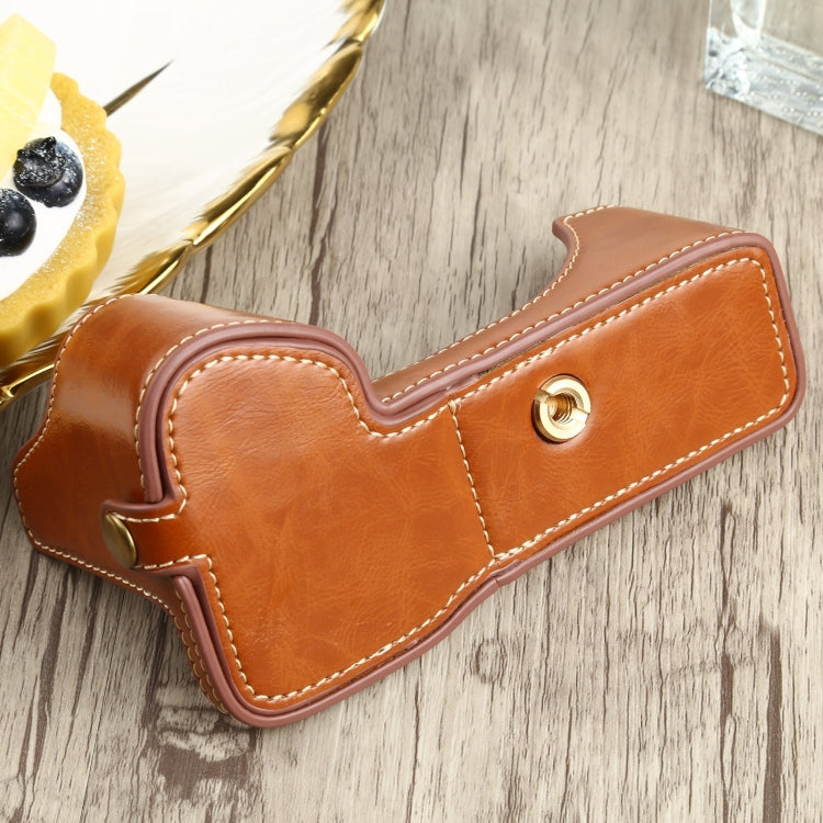 1/4 inch Thread PU Leather Camera Half Case Base for Sony ILCE-7RM4 / A7RM4 / A7R IV (Brown)