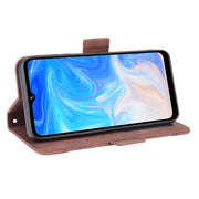 For Doogee N40 Pro Skin Feel Calf Pattern Horizontal Flip Leather Case with Holder & Card Slots & Photo Frame(Brown)