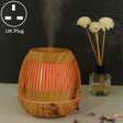 400ml Hollow-out LED Humidifier Wood Grain Air Purifier Aromatherapy Machine Automatic Alcohol Sprayer with Colorful LED Light, Plug Specification:UK Plug(Light Brown) - free shipping - PMC TechLife - Order now!