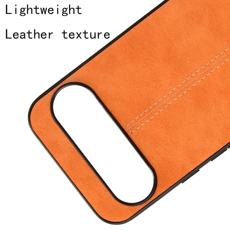 For Google Pixel 9 Pro Sewing Cow Pattern Skin PC + PU + TPU Phone Case(Orange)