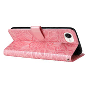 For iPhone 16e Embossed Sunflower Leather Phone Case(Pink)