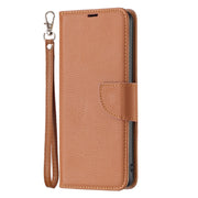 For iPhone 16 Plus Litchi Texture Pure Color Flip Leather Phone Case(Brown)