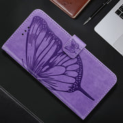 For iPhone 16 Embossed Butterfly Leather Phone Case(Light Purple)