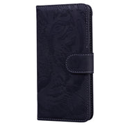 For iPhone 16 Tiger Embossing Pattern Leather Phone Case(Black)