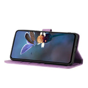 For iPhone 16e Flower Embossing Pattern Leather Phone Case(Purple)