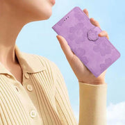 For iPhone 16e Flower Embossing Pattern Leather Phone Case(Purple)