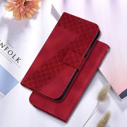 For Google Pixel 9 Seven-shaped Embossed Leather Phone Case(Red)