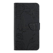 For Motorola Edge 5G 2024 HT03 Skin Feel Butterfly Embossed Flip Leather Phone Case(Black)