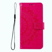 For iPhone 16 Pro Max Totem Flower Embossed Leather Phone Case(Red)