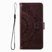 For iPhone 16 Plus Totem Flower Embossed Leather Phone Case(Brown)