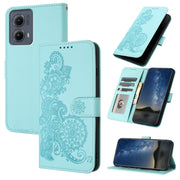 For Motorola Edge 5G 2024 Datura Flower Embossed Flip Leather Phone Case(Light Blue)
