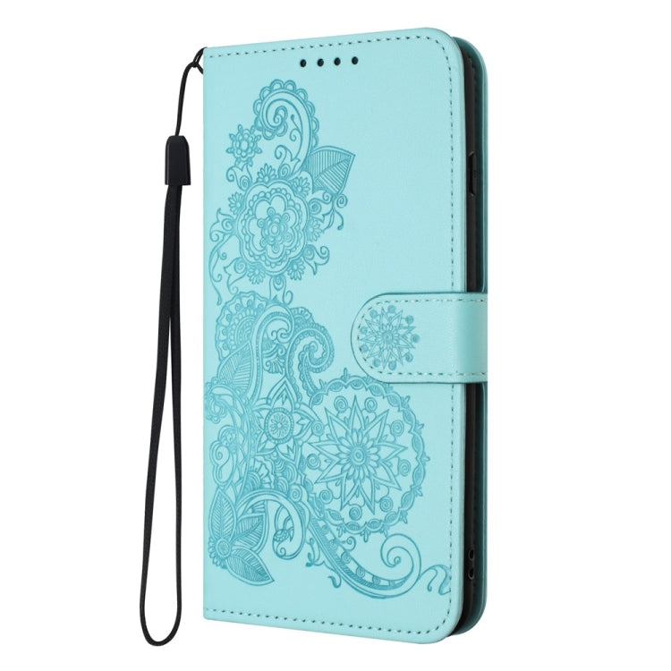 For Motorola Edge 5G 2024 Datura Flower Embossed Flip Leather Phone Case(Light Blue)