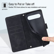For Google Pixel 9 Pro XL Skin-feel Embossed Leather Phone Case(Black)