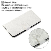 For Google Pixel 9 / 9 Pro Ethnic Style Embossed Pattern Leather Phone Case(White)