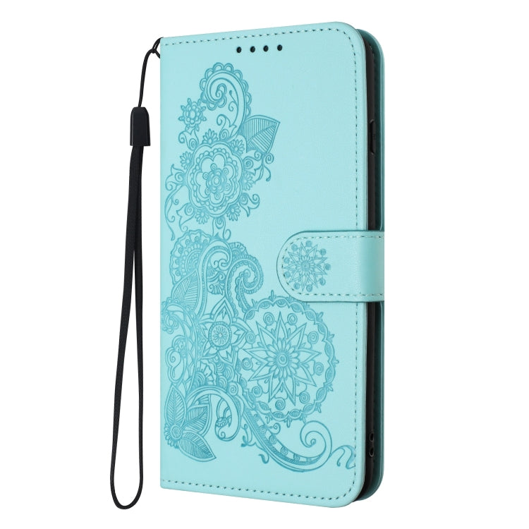 For Google Pixel 9 Pro Datura Flower Embossed Flip Leather Phone Case(Light blue)