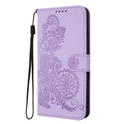For Google Pixel 9 Pro Datura Flower Embossed Flip Leather Phone Case(Purple)