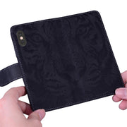 For Google Pixel 9 Tiger Embossing Pattern Flip Leather Phone Case(Black)