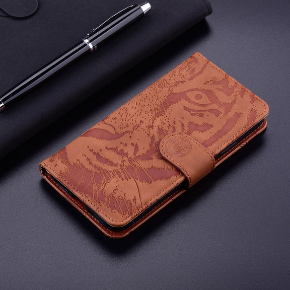 For Google Pixel 9 Tiger Embossing Pattern Flip Leather Phone Case(Brown)