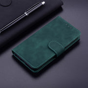 For Google Pixel 9 Pro Skin Feel Pure Color Flip Leather Phone Case(Green)