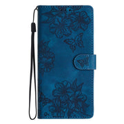 For iPhone 16e Cherry Blossom Butterfly Skin Feel Embossed PU Phone Case(Blue)