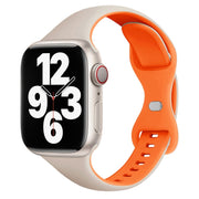 For Apple Watch SE 44mm Two Color Slim Butterfly Buckle Silicone Watch Band(Starlight Orange)