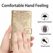 For Samsung Galaxy S25 5G Cherry Blossom Butterfly Skin Feel Embossed PU Phone Case(Gold)