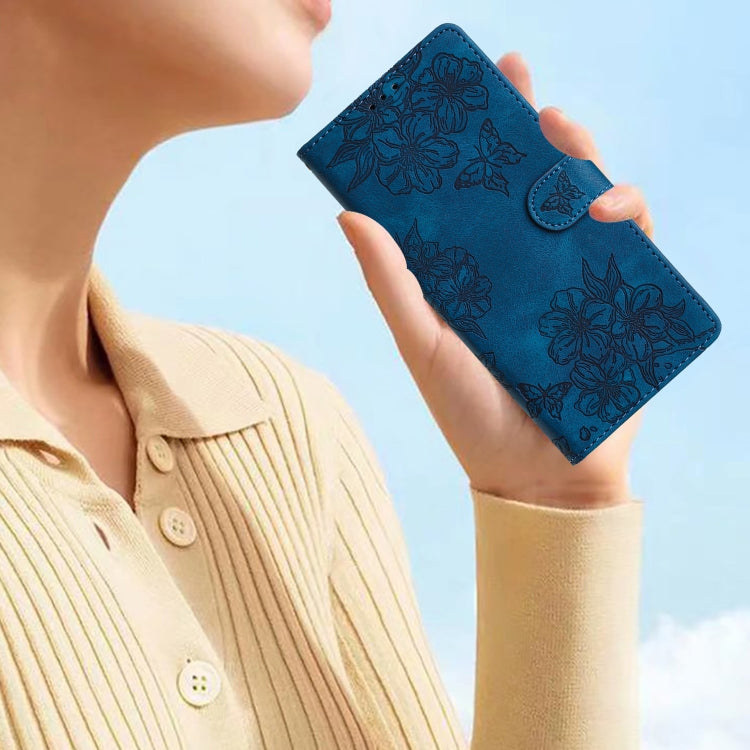 For Samsung Galaxy S25+ 5G Cherry Blossom Butterfly Skin Feel Embossed PU Phone Case(Blue)
