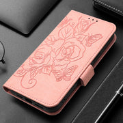 For Redmi K70 Ultra 5G Global Embossed Rose RFID Anti-theft Leather Phone Case(Pink)