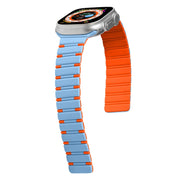 For Apple Watch SE 2023 44mm Two-color Magnetic Silicone Watch Band(Mist Blue Orange)