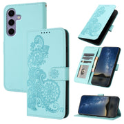 For Samsung Galaxy S25 5G Datura Flower Embossed Flip Leather Phone Case(Light Blue)
