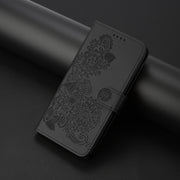 For Samsung Galaxy S25 Ultra 5G Datura Flower Embossed Flip Leather Phone Case(Black)