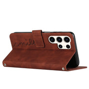 For Samsung Galaxy S25 Ultra 5G Skin Feel Heart Embossed Leather Phone Case with Long Lanyard(Brown)