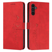 For Samsung Galaxy S25 / S24 5G Skin Feel Heart Embossed Leather Phone Case with Long Lanyard(Red)