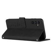 For Samsung Galaxy S25+ / S24+ 5G Skin Feel Heart Embossed Leather Phone Case with Long Lanyard(Black)