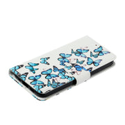 For Samsung Galaxy S25 5G Colored Drawing Marble Pattern Leather Phone Case(Little Blue Butterflies)