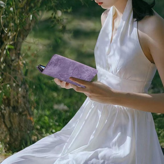 For Samsung Galaxy S25+ 5G Skin-feel Embossed Butterfly Leather Phone Case(Purple)