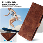 For Samsung Galaxy S25 5G Lace Floral Embossed Magnetic Buckle PU Phone Case With Wrist Strap(Brown)