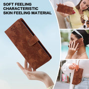 For Samsung Galaxy S25 5G Lace Floral Embossed Magnetic Buckle PU Phone Case With Wrist Strap(Brown)