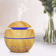 Wood Grain USB Hollowed-out Humidifier Seven Color Aromatherapy Lamp Automatic Alcohol Sprayer with Remote Control(Light Brown-2) - free shipping - PMC TechLife - Order now!
